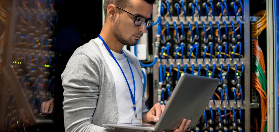 Man Managing Supercomputer Servers