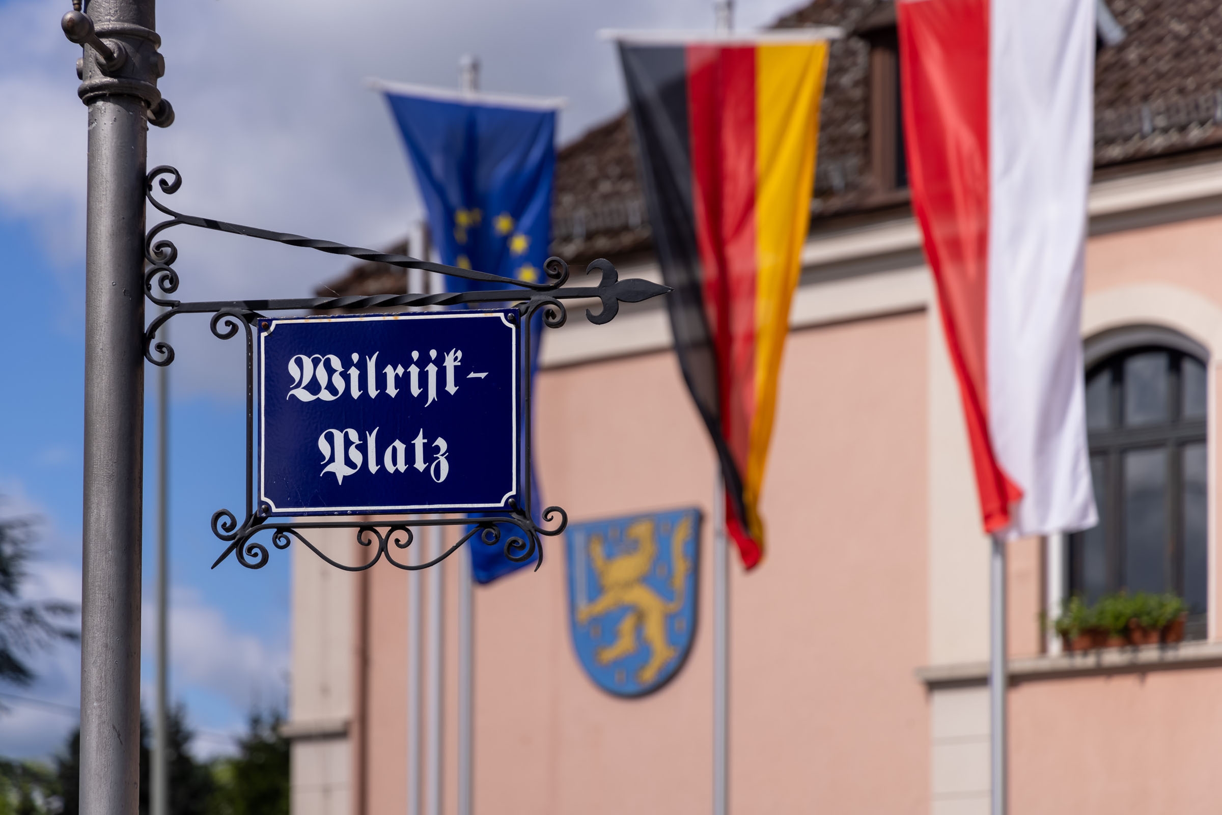 Straßenschild mit der Aufschrift "Wilrijkplatz"